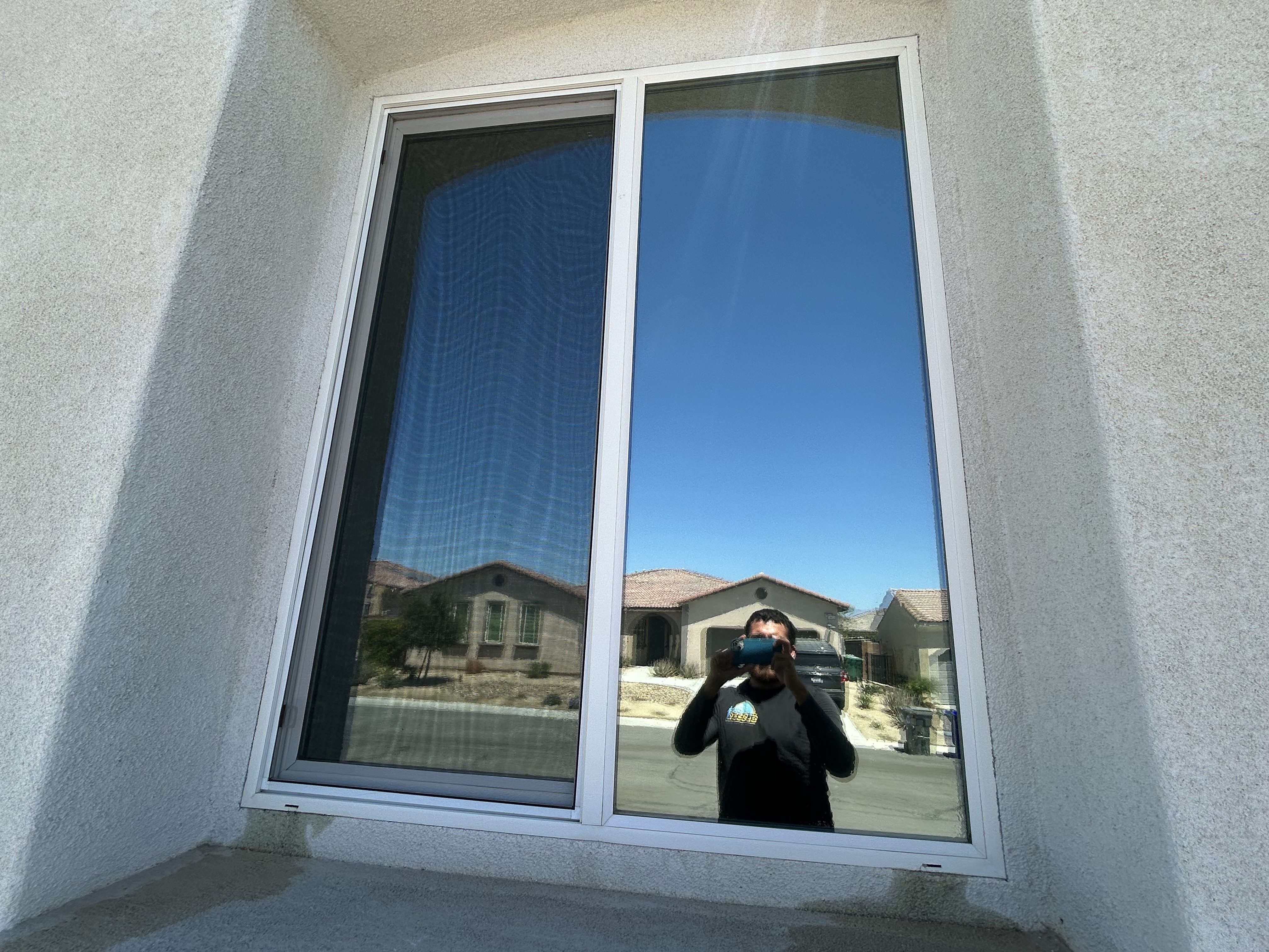 DR 5 percent privacy film on a tall residential window