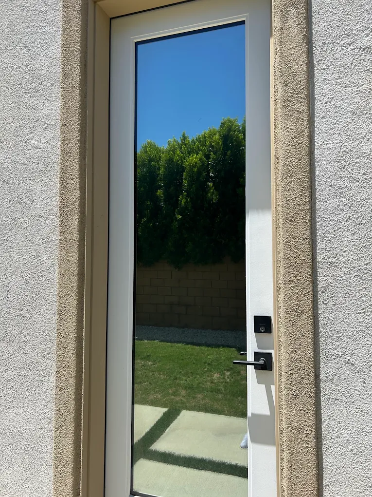 DR 5 percent window film installed on a tall entry door